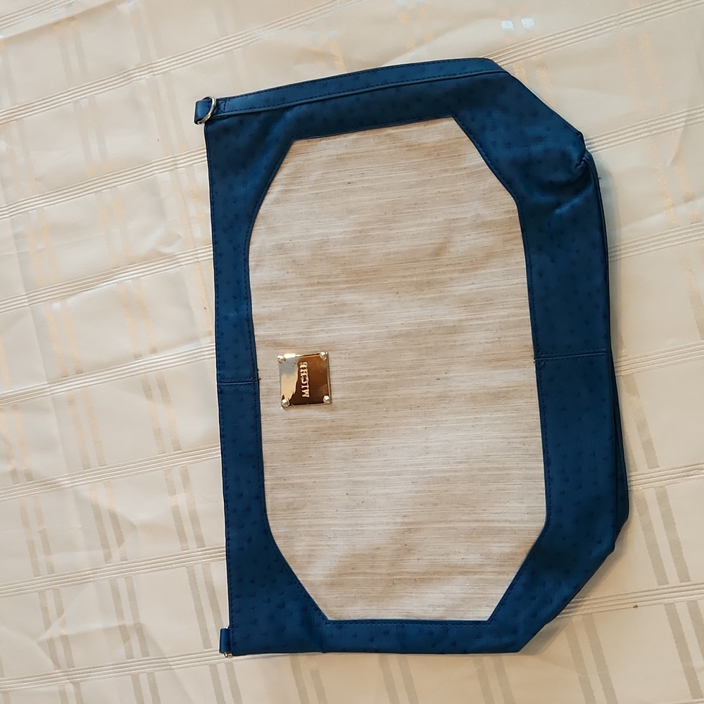 cream and dark teal miche shell